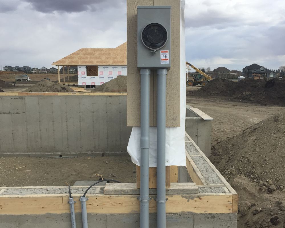 Service mast and meter base on a new build