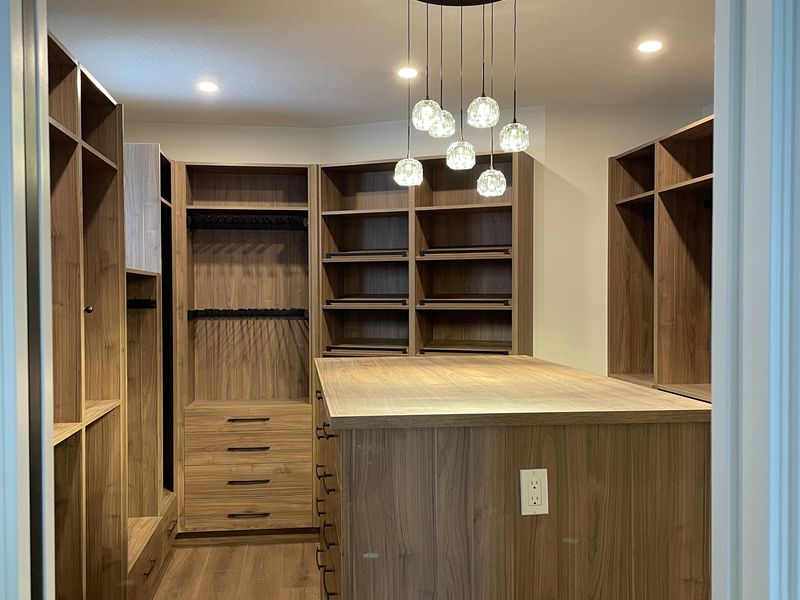 Walk-in closet with crystal pendant lighting